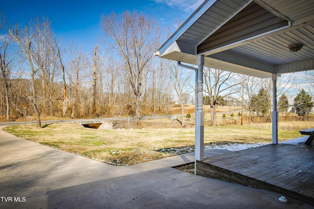 view of yard with a wooden deck