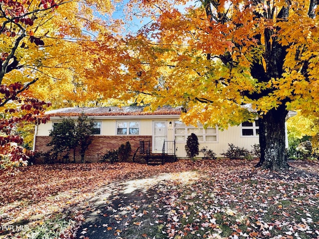 view of front of property with brick siding