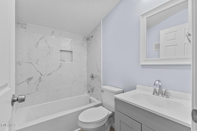 bathroom featuring visible vents, toilet, tub / shower combination, vanity, and a textured ceiling