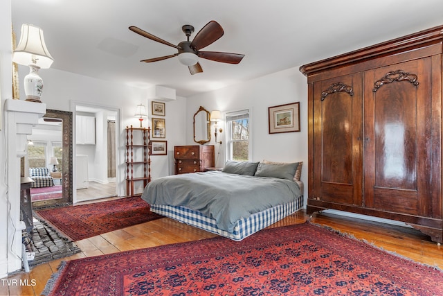 bedroom featuring ceiling fan and light wood finished floors