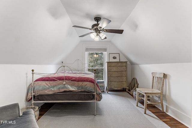 bedroom featuring lofted ceiling, ceiling fan, and baseboards