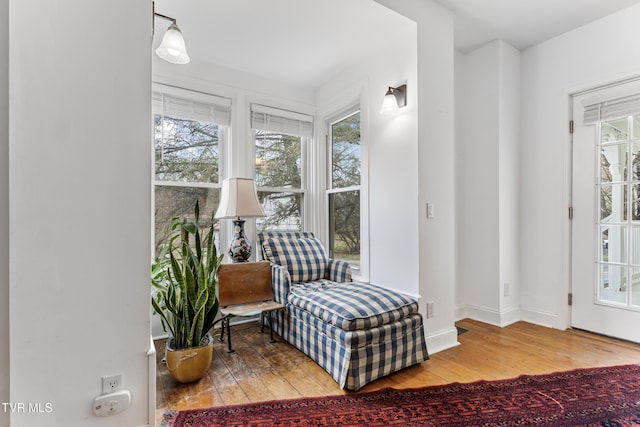 sitting room featuring wood finished floors and baseboards