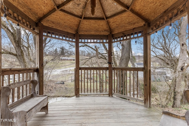 wooden terrace with a gazebo