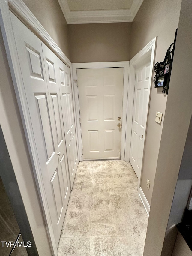 hallway with crown molding