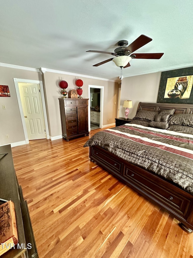 bedroom featuring light wood-style flooring, baseboards, ceiling fan, and crown molding