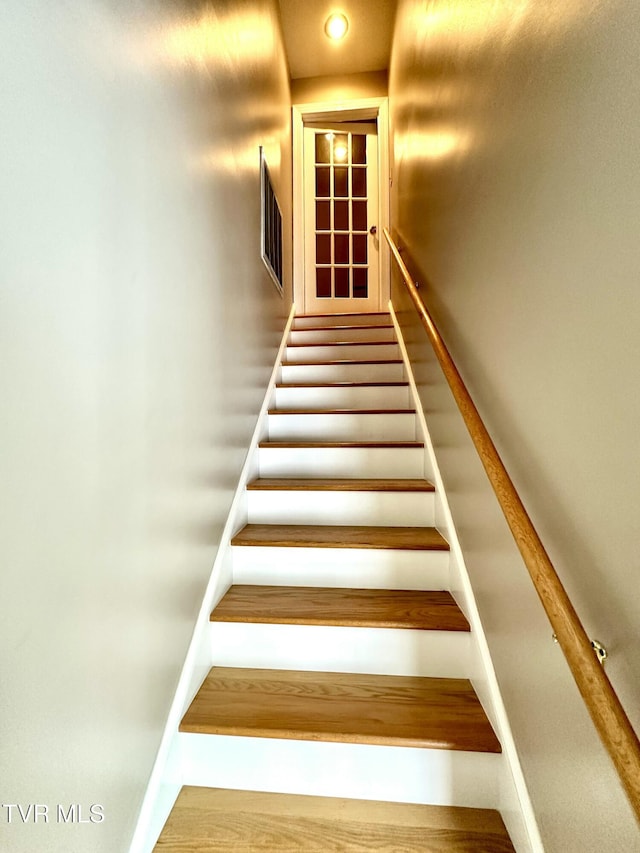 staircase with baseboards