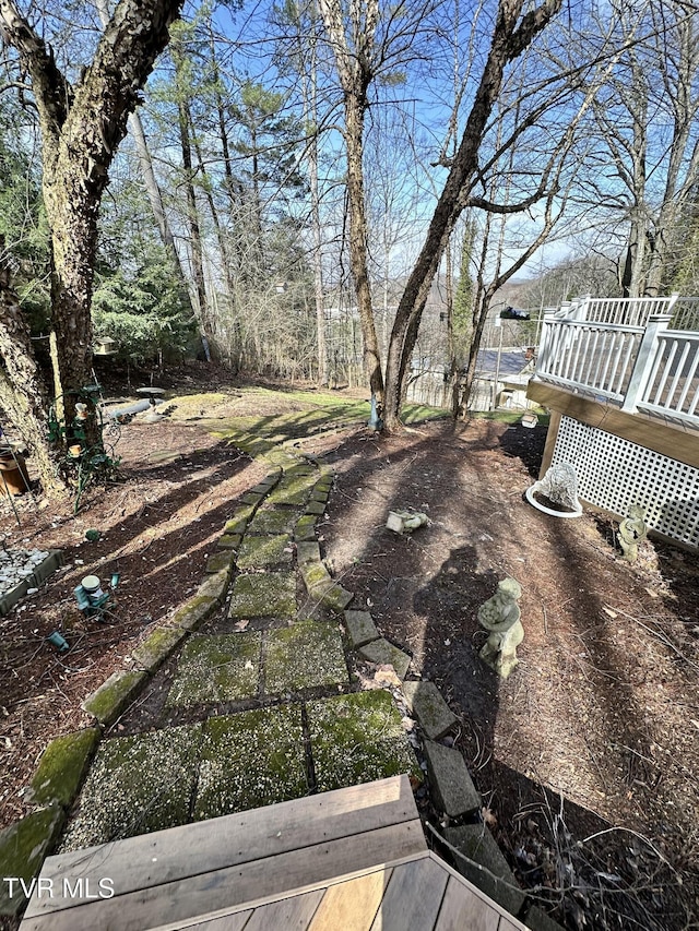 view of yard featuring a deck