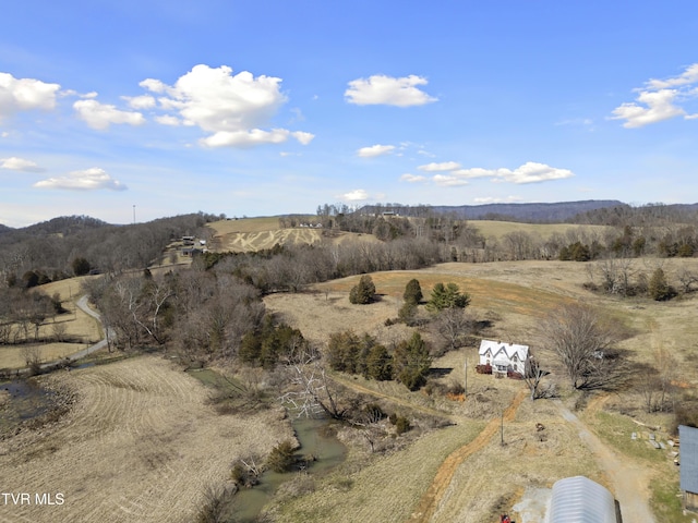 birds eye view of property featuring a rural view