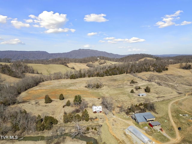 property view of mountains featuring a rural view