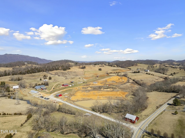 drone / aerial view with a rural view and a mountain view