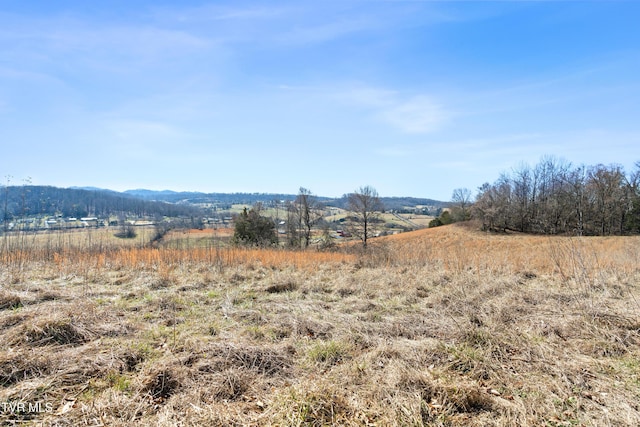 view of mountain feature featuring a rural view