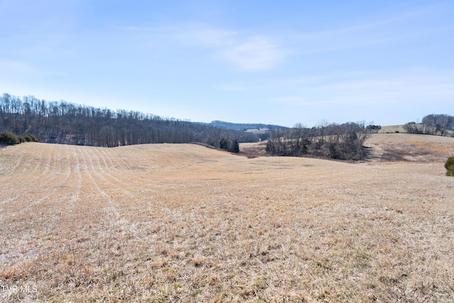 exterior space with a rural view