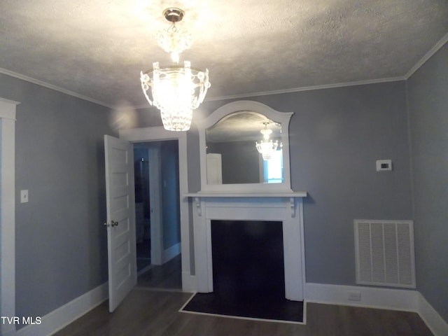 unfurnished living room with a chandelier, visible vents, ornamental molding, and dark wood-type flooring