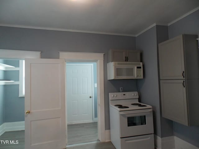 kitchen with light wood-style floors, white appliances, and gray cabinetry