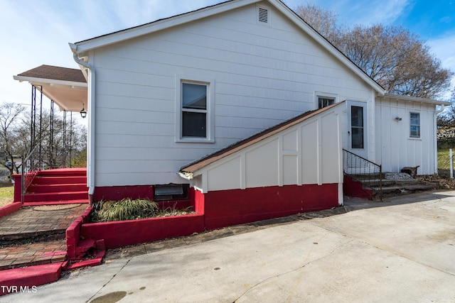 204 Johnston Ave, Bristol, TN 37620 - back of house featuring entry steps and board and batten siding