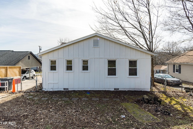 204 Johnston Ave, Bristol, TN 37620 - rear view of house featuring crawl space, fence, and board and batten siding