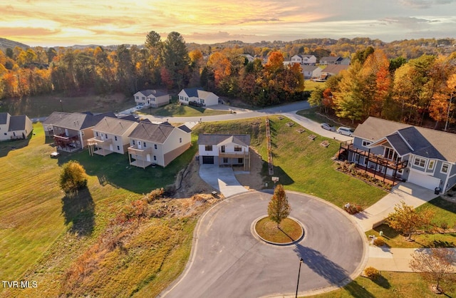 birds eye view of property with a residential view