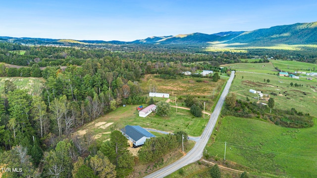 bird's eye view with a mountain view and a rural view