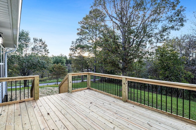 deck featuring a lawn