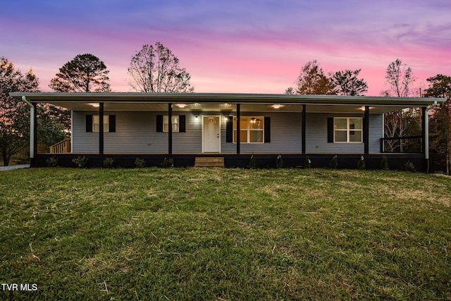 view of front of home with a front lawn