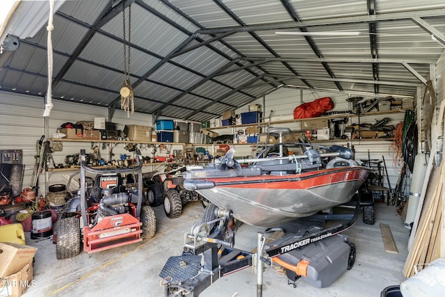 garage with metal wall and a workshop area