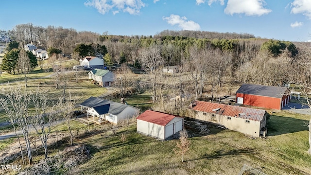 aerial view featuring a wooded view