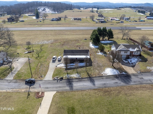 drone / aerial view with a rural view and a mountain view