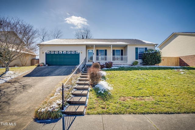 single story home with aphalt driveway, a porch, fence, a garage, and a front lawn