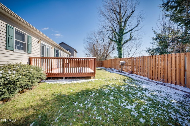 view of yard with a fenced backyard and a deck