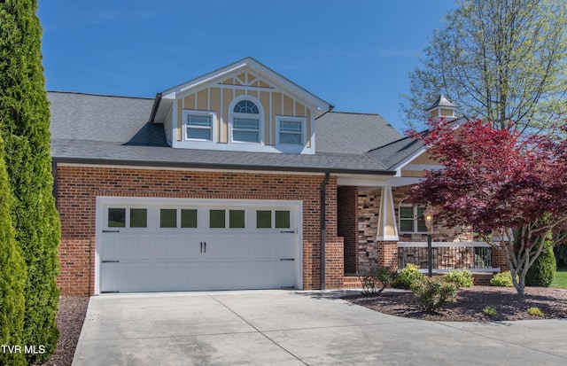view of front of house featuring brick siding, a porch, concrete driveway, and roof with shingles