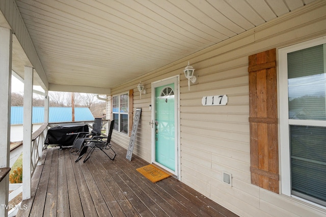 deck featuring covered porch