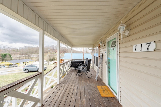 deck with covered porch