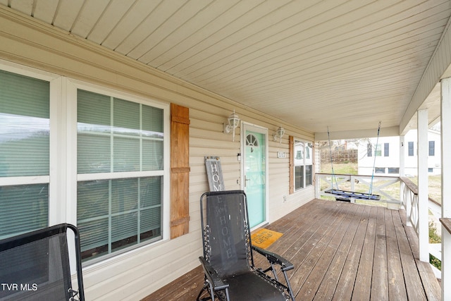 wooden terrace with covered porch