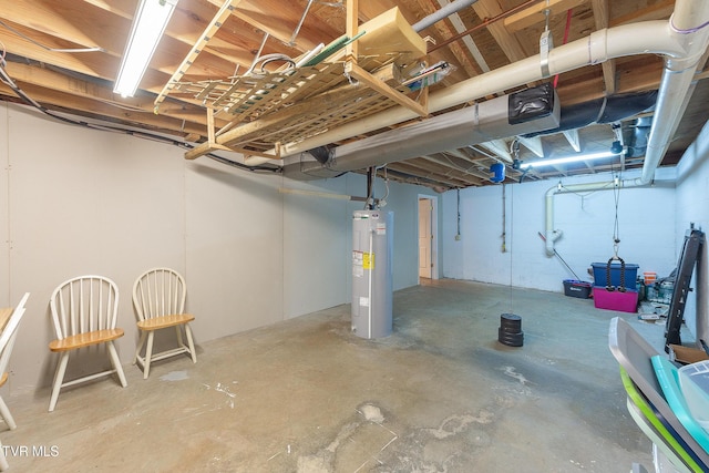 unfinished basement featuring water heater