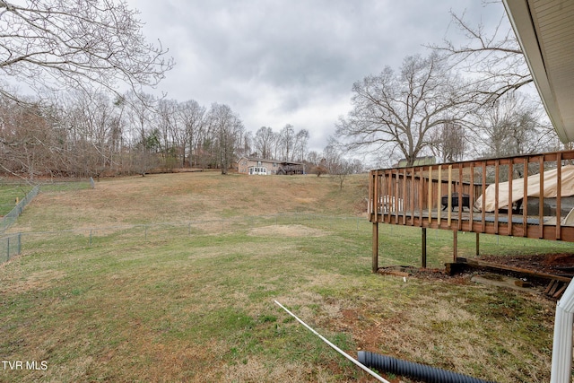 view of yard with a wooden deck