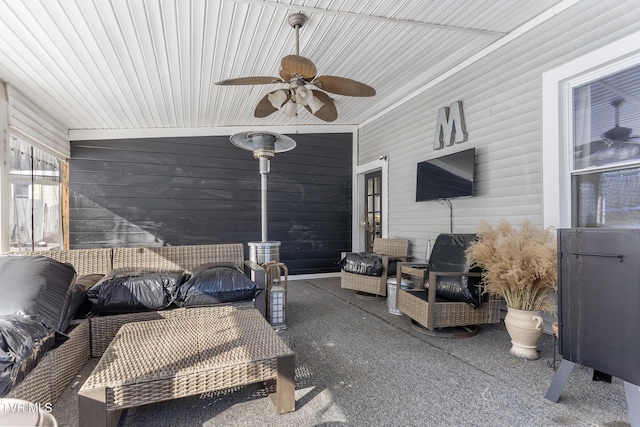 view of patio featuring an outdoor hangout area and a ceiling fan