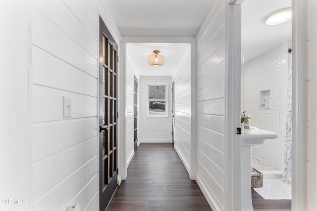 hallway featuring dark wood finished floors