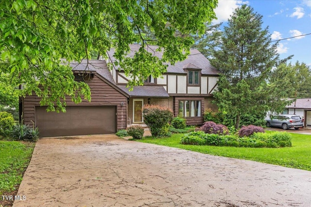 1016 Grace Dr, Johnson City, TN 37604 - tudor home with driveway and an attached garage