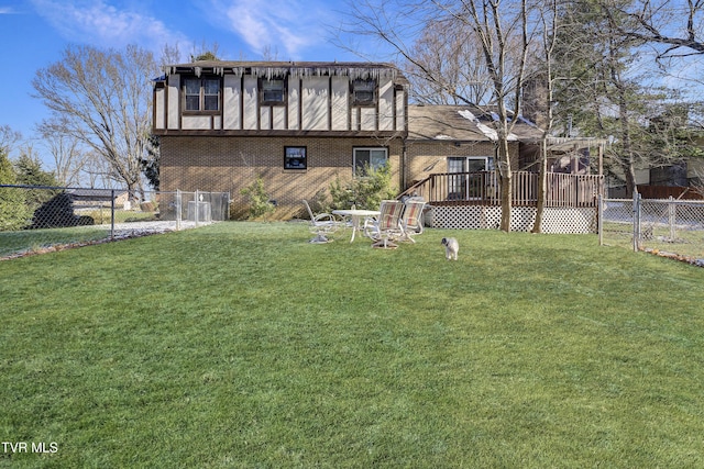1016 Grace Dr, Johnson City, TN 37604 - rear view of house with brick siding and a wooden deck