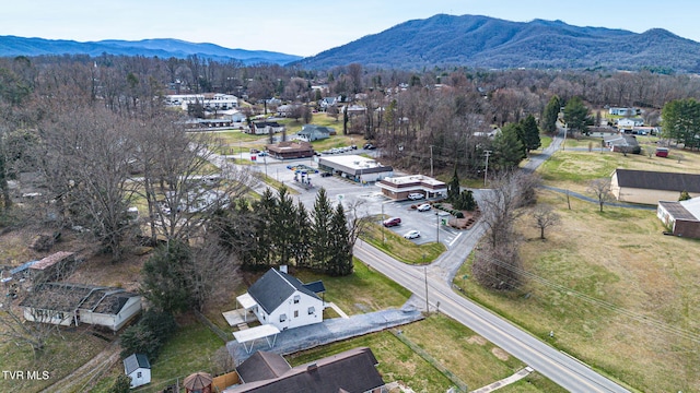 birds eye view of property with a residential view and a mountain view