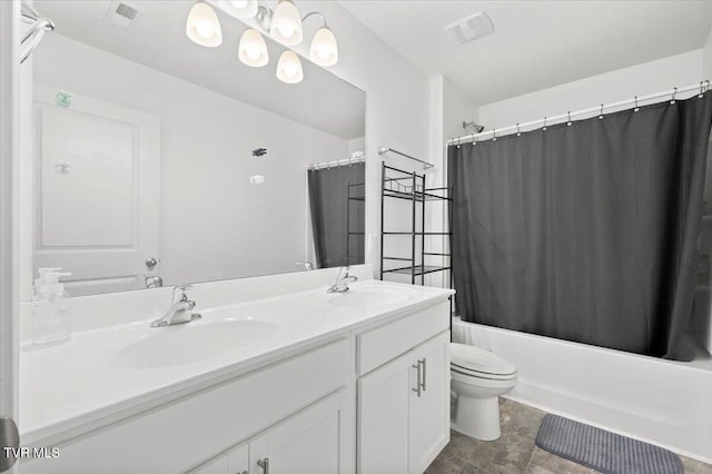 bathroom with shower / tub combo with curtain, visible vents, a sink, and toilet