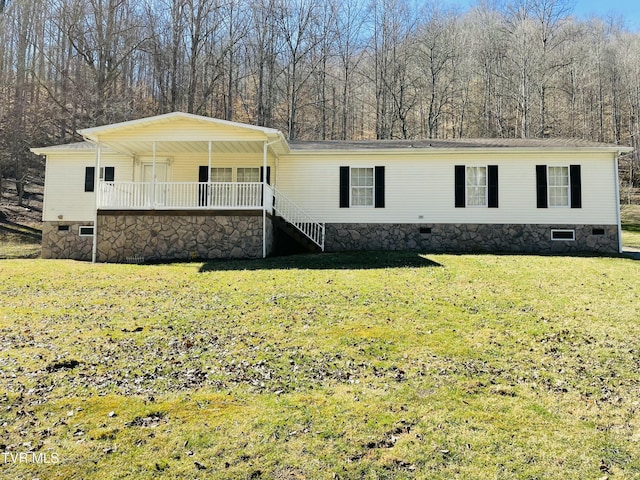 manufactured / mobile home with crawl space, a porch, and a front lawn