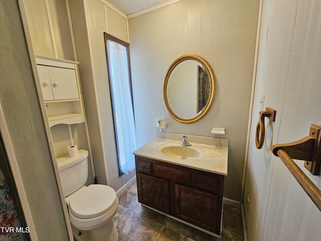 bathroom with toilet and vanity