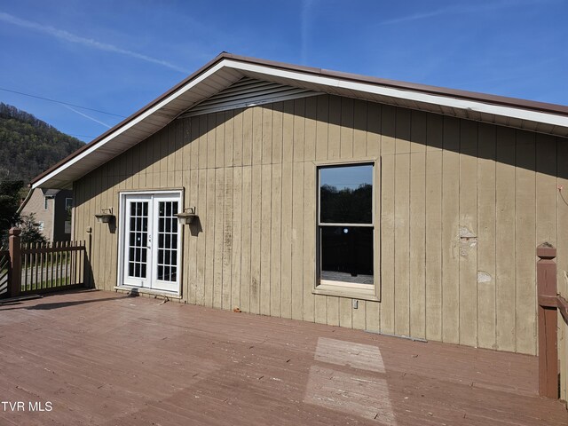 316 W Shawnee Ave, Big Stone Gap, VA 24219 - view of side of property with french doors and a wooden deck