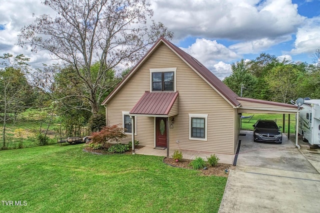 bungalow-style home with a carport, concrete driveway, metal roof, and a front lawn