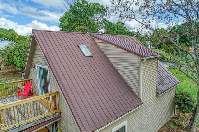 view of home's exterior featuring metal roof