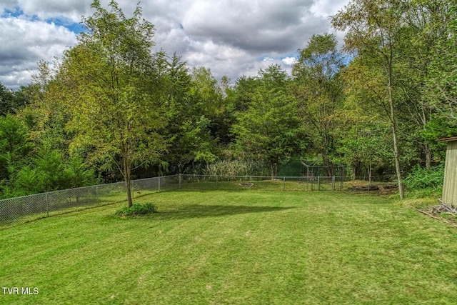 view of yard featuring fence