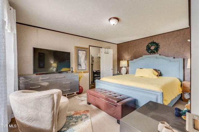 bedroom featuring carpet flooring and crown molding