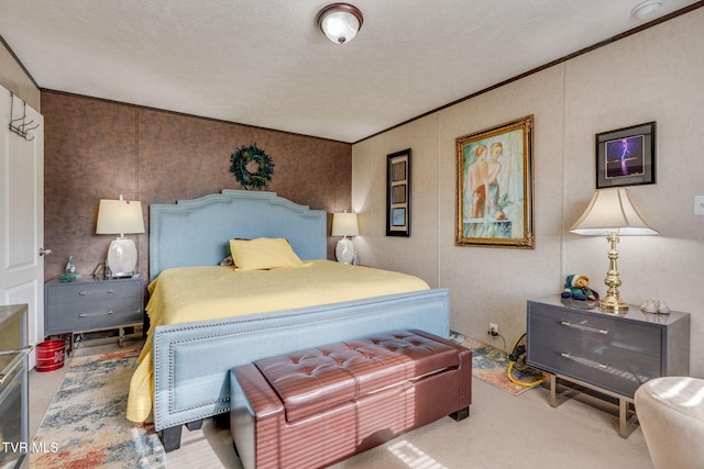 carpeted bedroom with ornamental molding