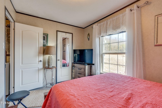 bedroom featuring crown molding